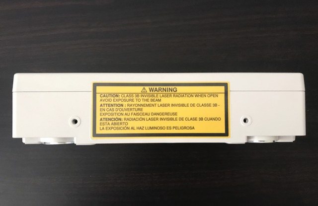 The Touch Unit emits infrared light downward across the screen surface. When the light is interrupted by a pen or finger, that sends a signal to the projector, via the infrared camera, that some action is taking place.