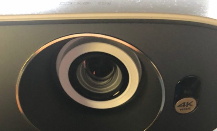 A closer look at the BenQ's recessed lens. You can see on the top, the recessed area for zoom and focus dials.