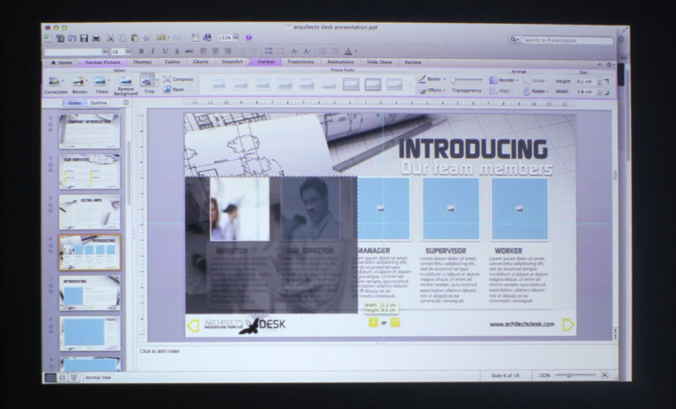 Casio XJ-S400UN projecting a PowerPoint presentation.