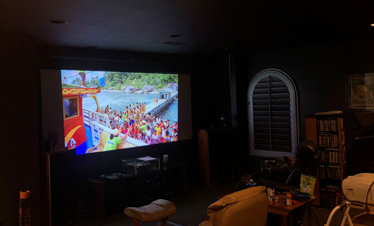 Check out the AAXA 4K1 – filling a 100” diagonal image in my old home theater. Even with low back lights on, bright vivid colors!