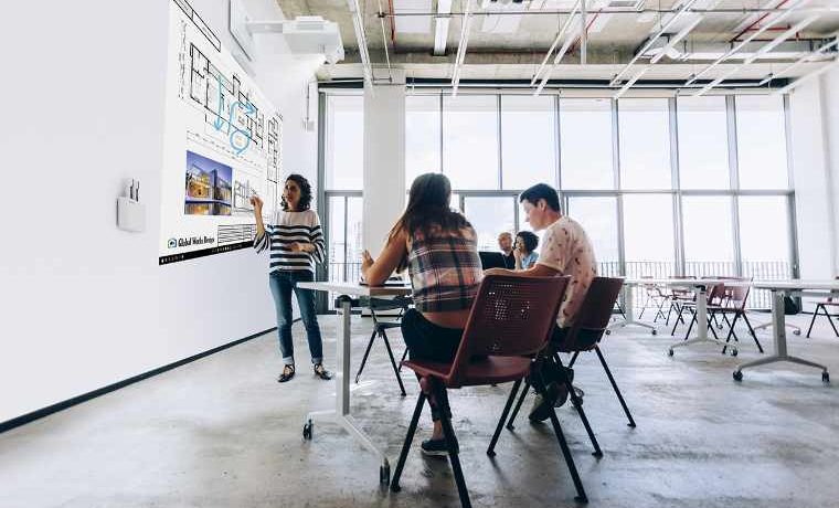 Teacher and students in classroom.